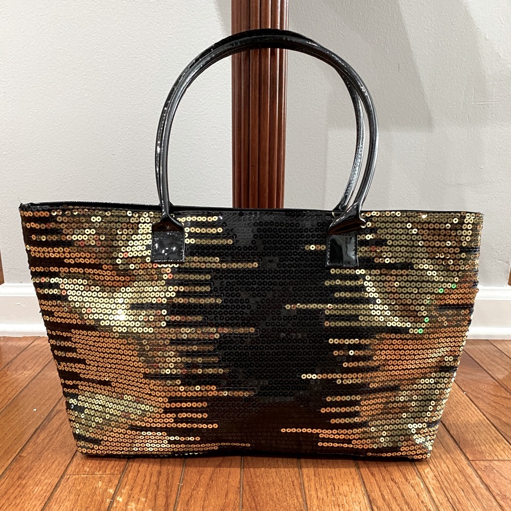 Venus sequins satin interior black and gold tote.